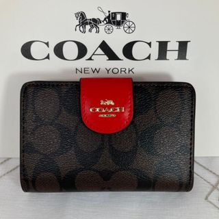 コーチ(COACH)の新品　COACH 二つ折り財布　ブラウン　レッド　シグネチャー　小銭入れ有(財布)