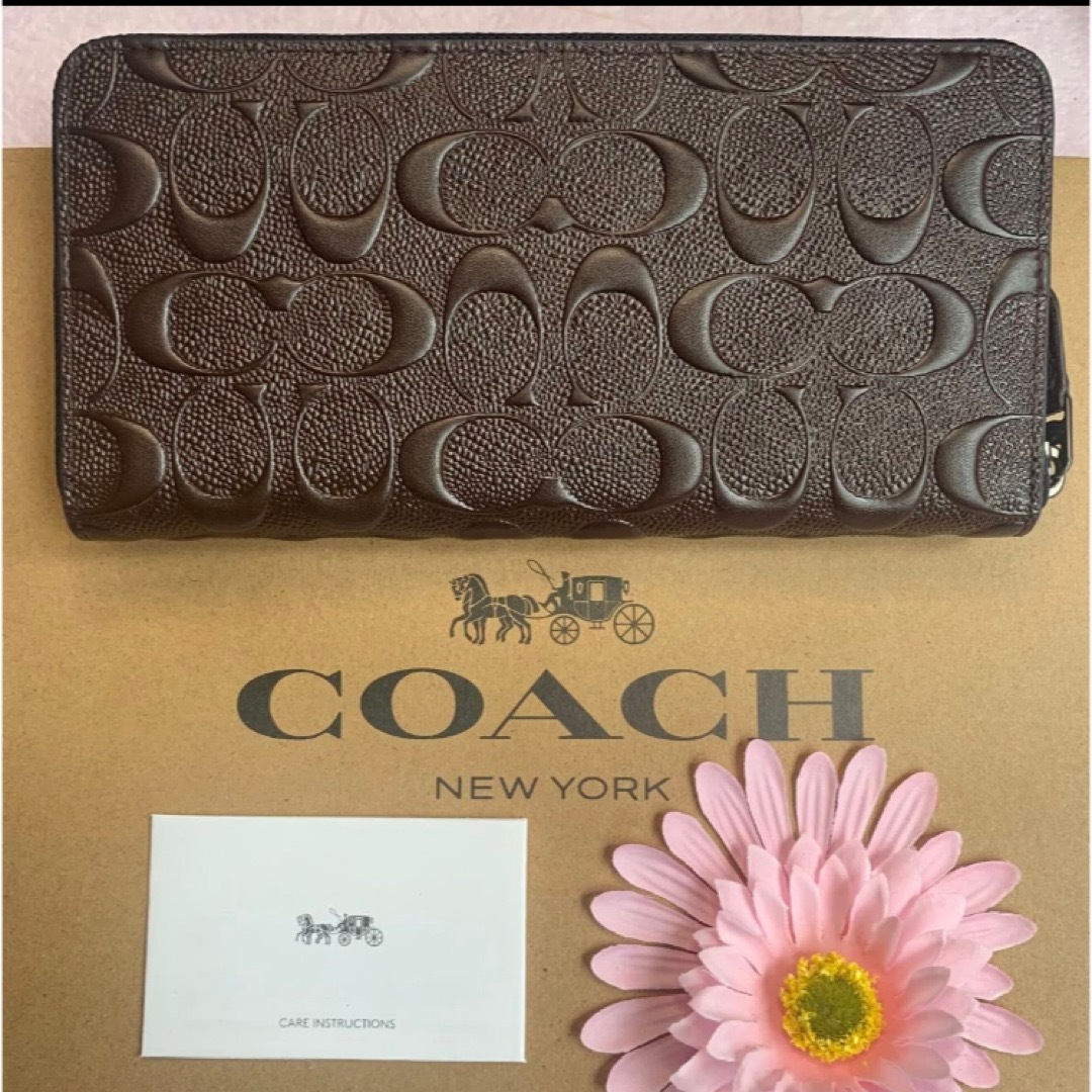 COACH(コーチ)の新品　COACH 長財布　エンボス　ブラウン　ラウンドファスナー　小銭入れ有 レディースのファッション小物(財布)の商品写真