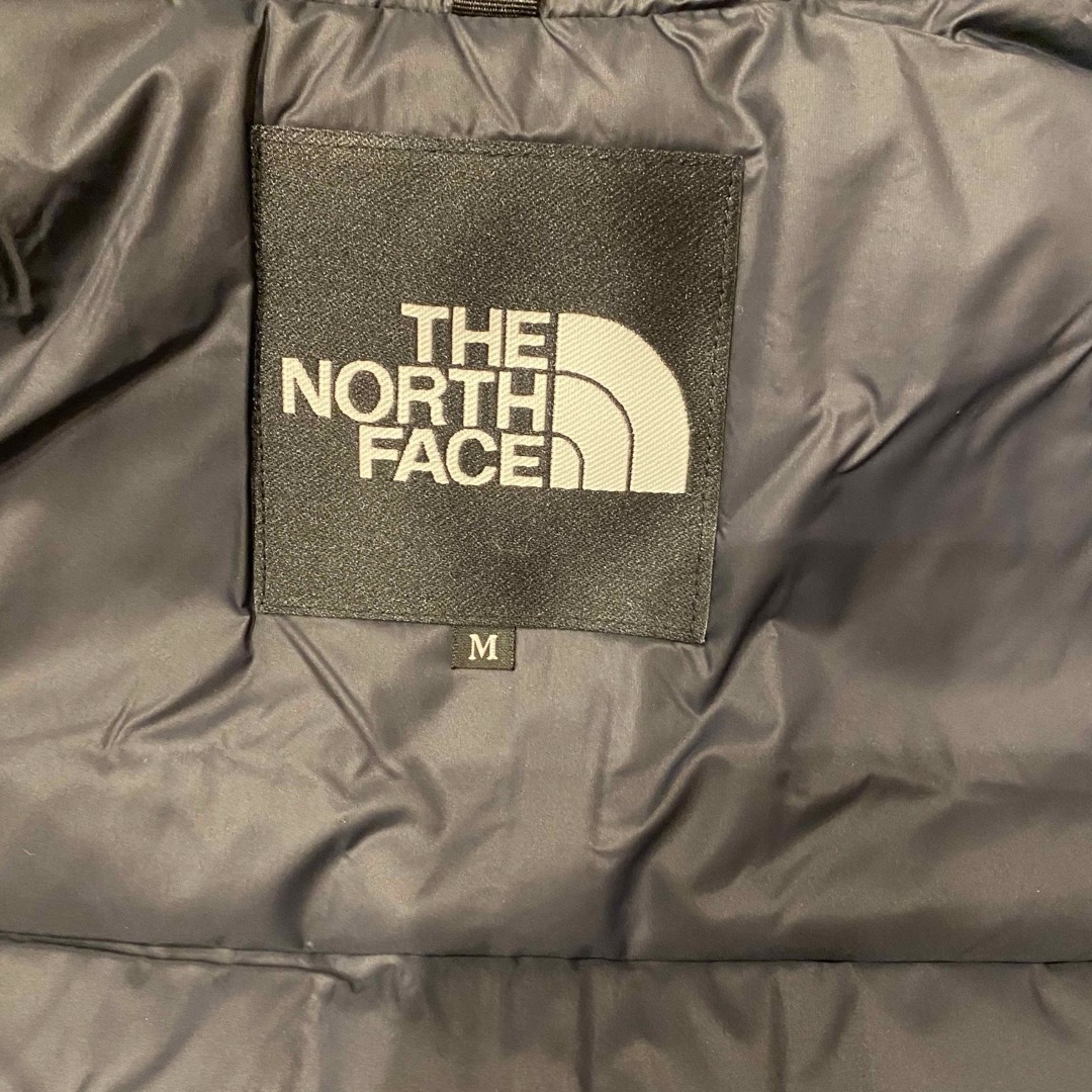 THE NORTH FACE(ザノースフェイス)の新品未使用 ザ・ノース・フェイス マウンテンダウンジャケット Mサイズ イエロー メンズのジャケット/アウター(ダウンジャケット)の商品写真