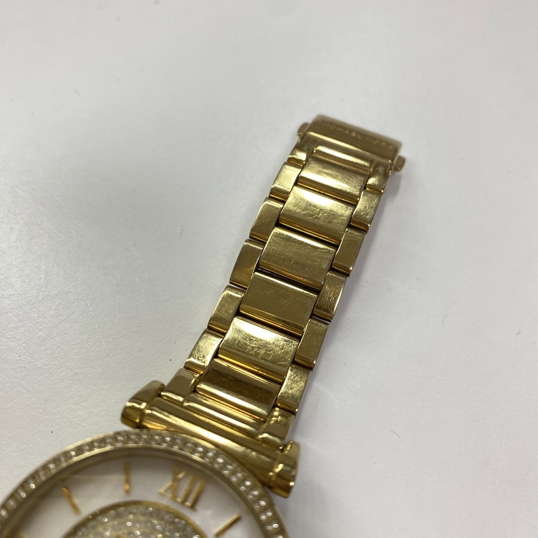 MICHAEL KORS - MICHAEL KORS▽ゴールド 文字盤キラキラ腕時計の MICHAEL KORS - MICHAEL KORS▽ゴールド 文字盤キラキラ腕時計の