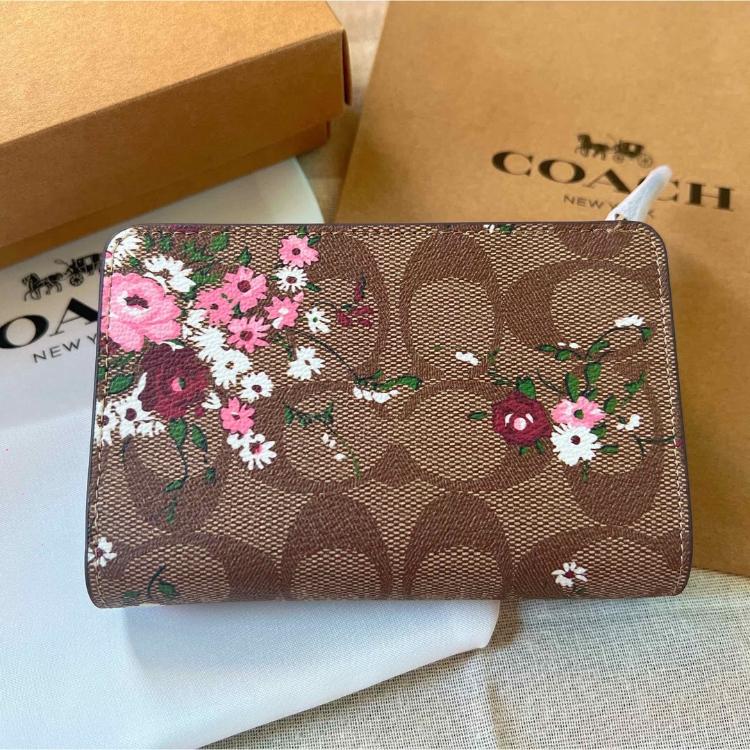 【新品】COACH コーチ 二つ折り財布 花柄 シグネチャー ベビーピンクピンク