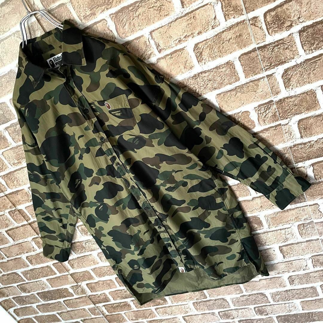 A BATHING APE(アベイシングエイプ)の【美品】アベイシングエイプ　カモフラージュシャツワンピース　チュニック　迷彩 レディースのトップス(シャツ/ブラウス(長袖/七分))の商品写真