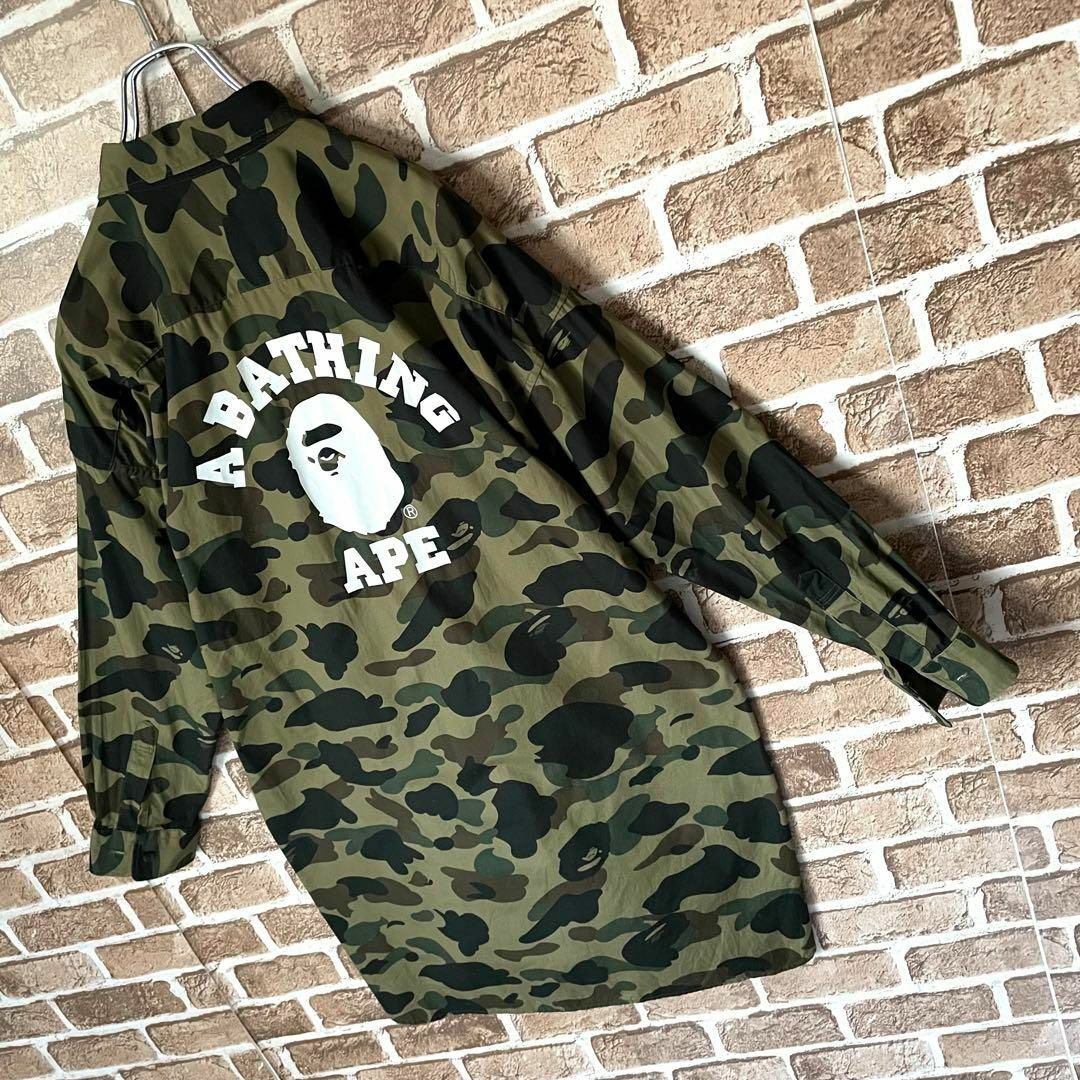 A BATHING APE(アベイシングエイプ)の【美品】アベイシングエイプ　カモフラージュシャツワンピース　チュニック　迷彩 レディースのトップス(シャツ/ブラウス(長袖/七分))の商品写真