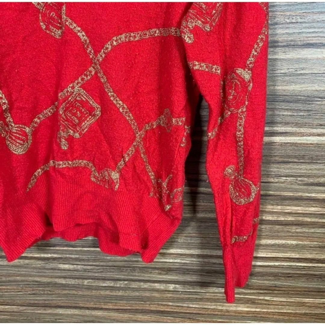 ニット セーター️ Mサイズ レディース 赤 レッド 総柄 長袖 Vネック レディースのトップス(ニット/セーター)の商品写真