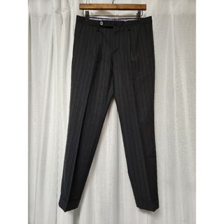 ジーティーアー(G.T.A)の【美品】GTA　LANAWOOL　1p　黒　ストライプ　44　春夏(スラックス)