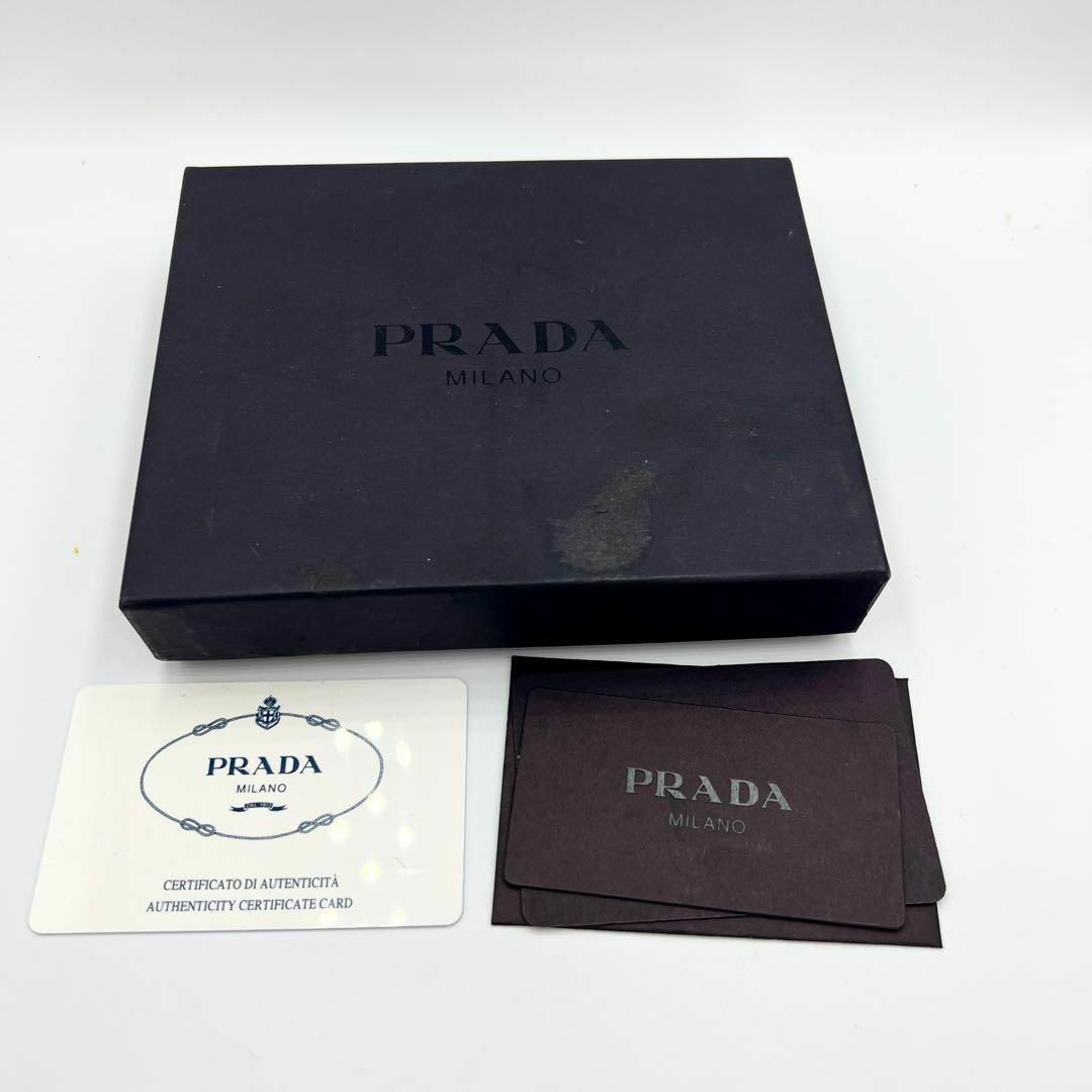買い PRADA プラダ 三角ロゴ テスート 二つ折り財布 M605 ブラック
