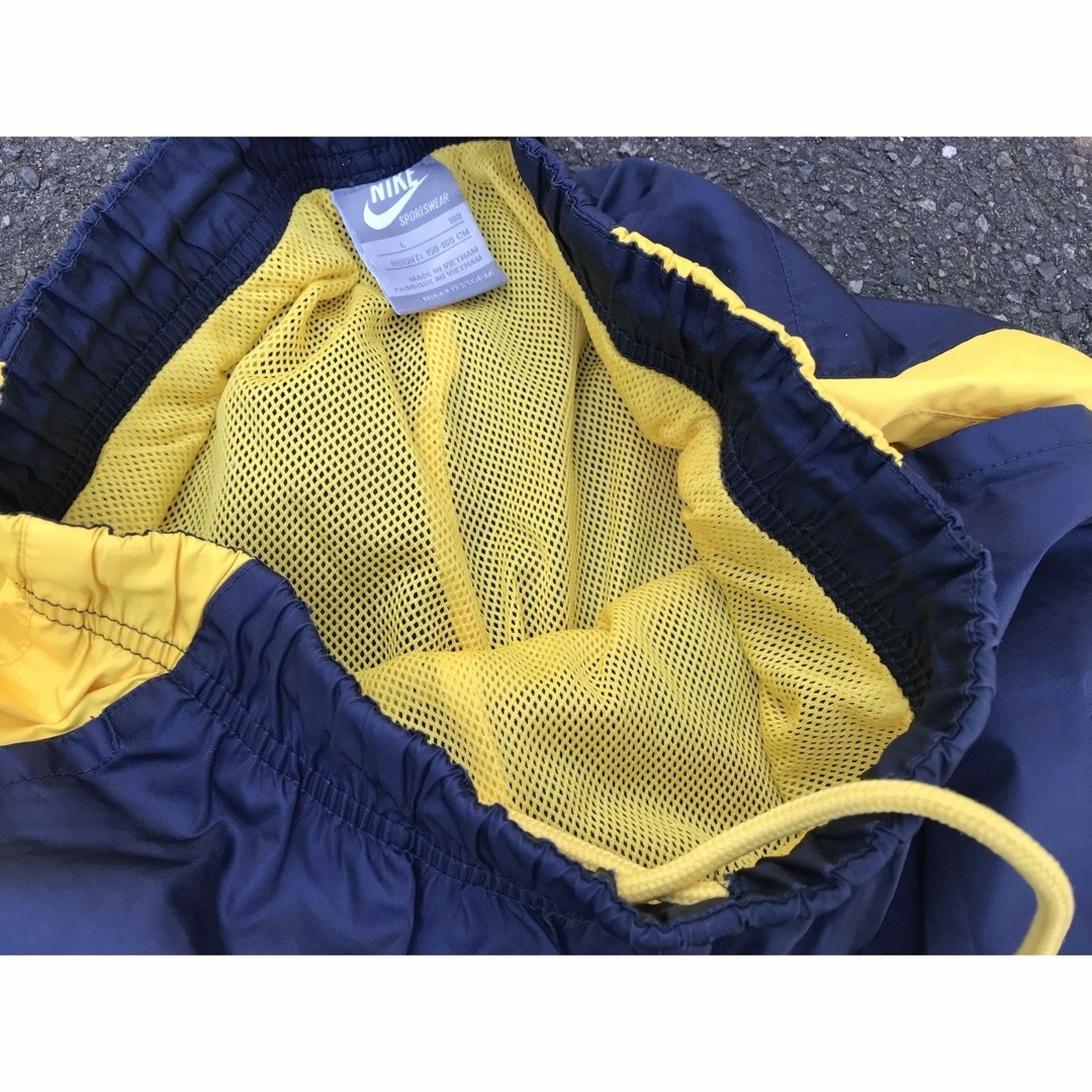 NIKE(ナイキ)の値下げ NIKE ウィンドブレーカーpants kids  L 160 スポーツ/アウトドアのトレーニング/エクササイズ(その他)の商品写真