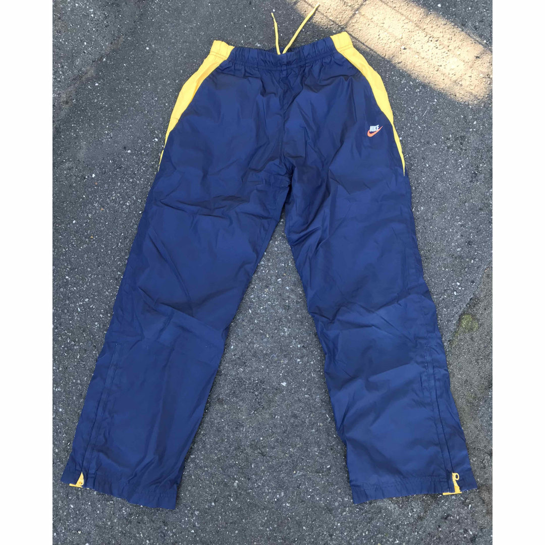 NIKE(ナイキ)の値下げ NIKE ウィンドブレーカーpants kids  L 160 スポーツ/アウトドアのトレーニング/エクササイズ(その他)の商品写真