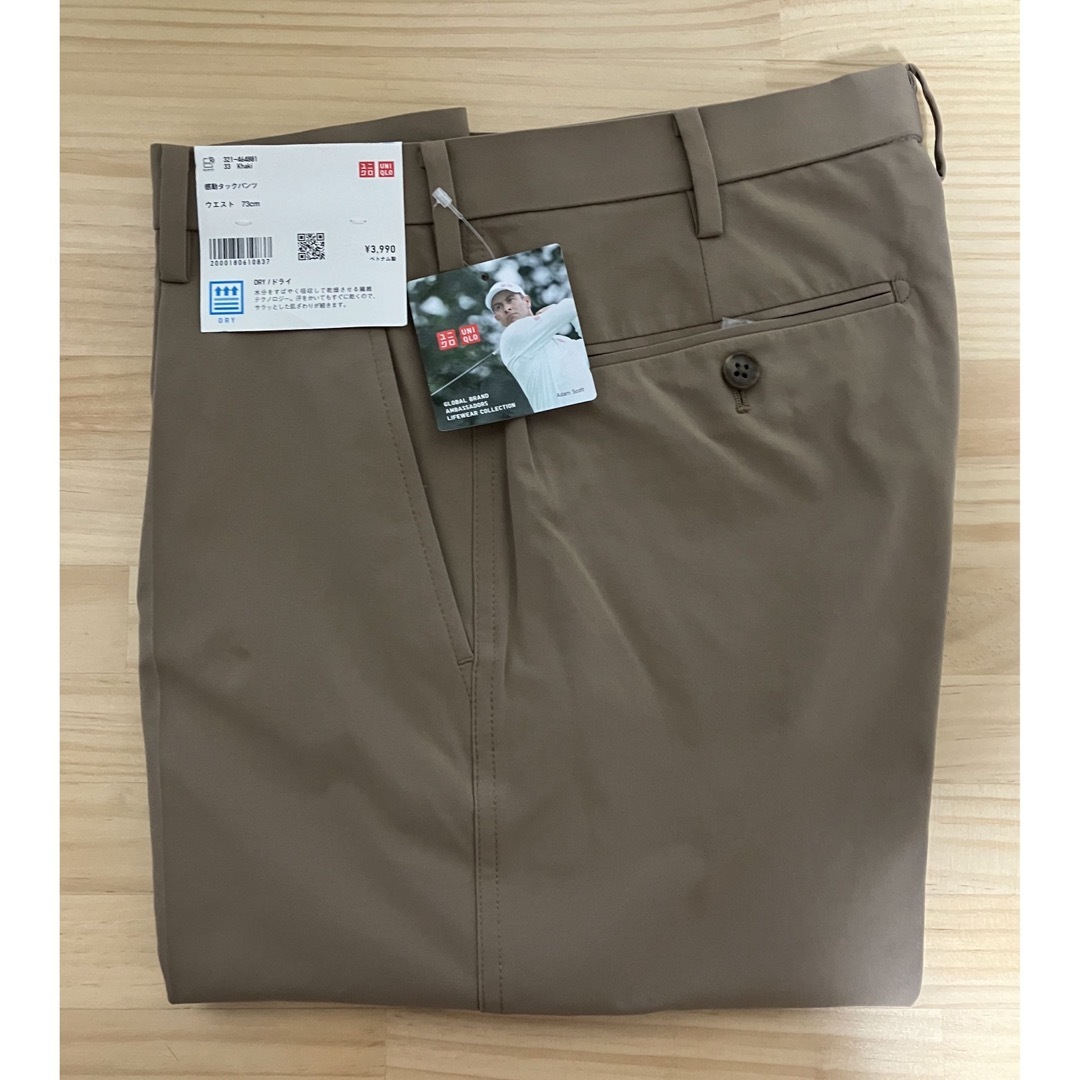 UNIQLO(ユニクロ)の新品　ユニクロ　感動タックパンツ アダム・スコット着用モデル　ウエスト73 メンズのパンツ(スラックス)の商品写真