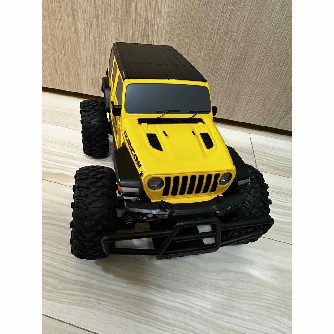 Jeep(ジープ)のジープ ラングラー ルビコン　黄色　動作確認済み エンタメ/ホビーのおもちゃ/ぬいぐるみ(ホビーラジコン)の商品写真