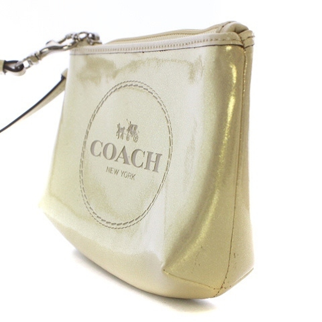 COACH(コーチ)のコーチ ポーチ ミニ ハンドバッグ リストレット パテントレザー ゴールドカラー レディースのファッション小物(ポーチ)の商品写真