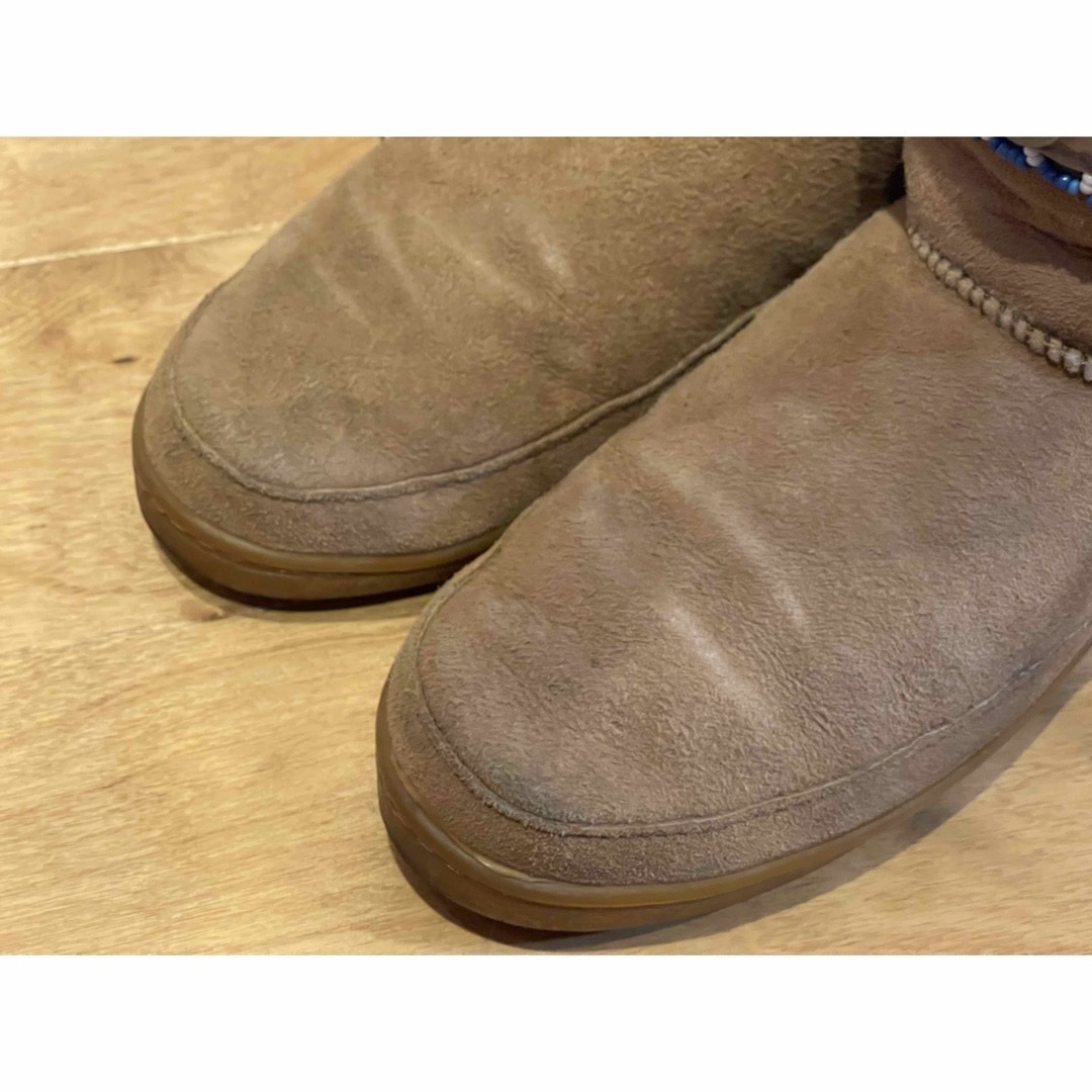 Minnetonka(ミネトンカ)のMINNETONKA  ミネトンカ　ムートンブーツ　アフガンベルト レディースの靴/シューズ(ブーツ)の商品写真