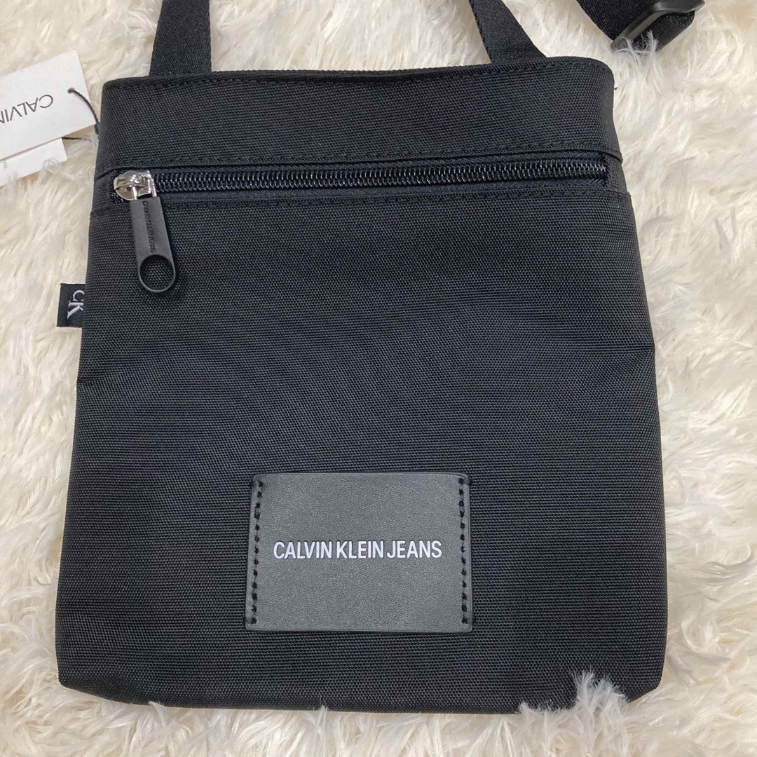 Calvin Klein(カルバンクライン)のカルバンクライン ショルダーバッグ　サコッシュ ポシェット 男女兼用 黒 メンズのバッグ(ショルダーバッグ)の商品写真