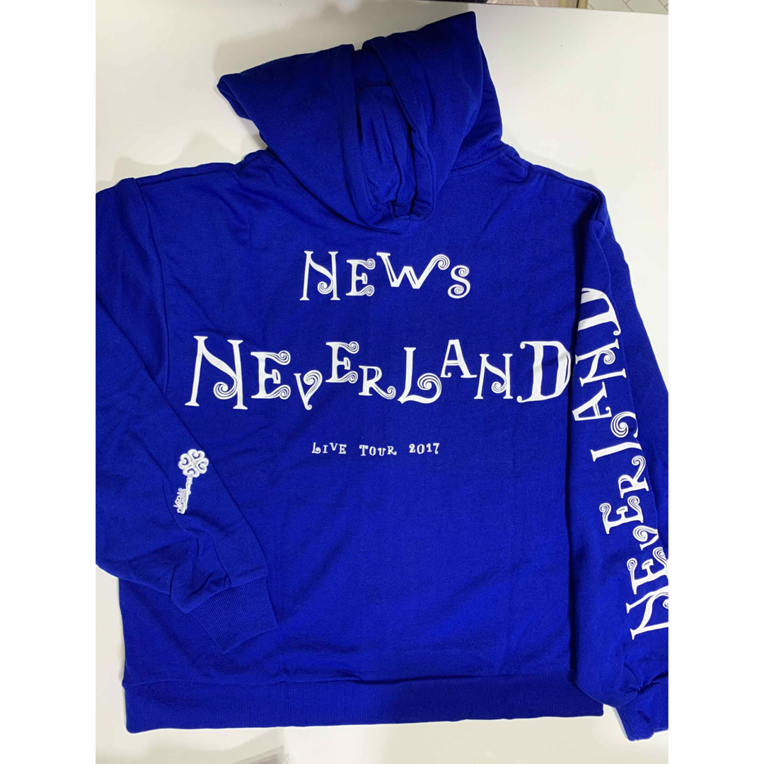 NEWS(ニュース)のNEWS NEVERLANDツアーパーカー エンタメ/ホビーのタレントグッズ(アイドルグッズ)の商品写真