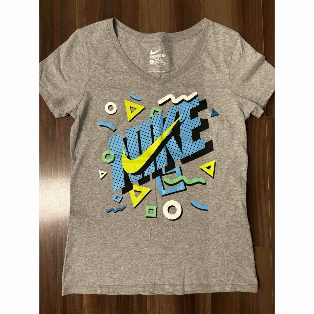 NIKE(ナイキ)のNIKE レディースTシャツ　L レディースのトップス(Tシャツ(半袖/袖なし))の商品写真