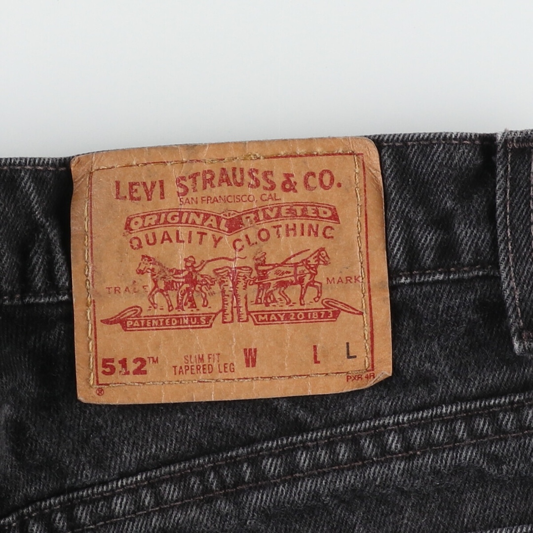 Levi's(リーバイス)の古着 90年代 リーバイス Levi's 512 SLIM FIT TAPERED LEG ブラックデニム テーパードデニムパンツ USA製 レディースL(w28) ヴィンテージ /eaa414902 レディースのパンツ(デニム/ジーンズ)の商品写真