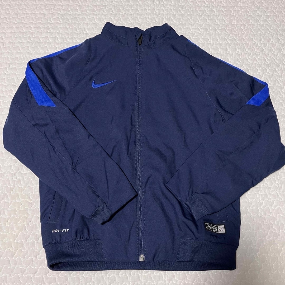 NIKE(ナイキ)の【新品未使用】NIKE キッズセットアップ ジャージ 140cm スポーツ/アウトドアのサッカー/フットサル(ウェア)の商品写真