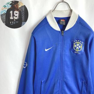 ナイキ(NIKE)の90s古着ナイキ トラックジャケット ブラジル 刺繍スウッシュロゴ ブルー白色M(ジャージ)