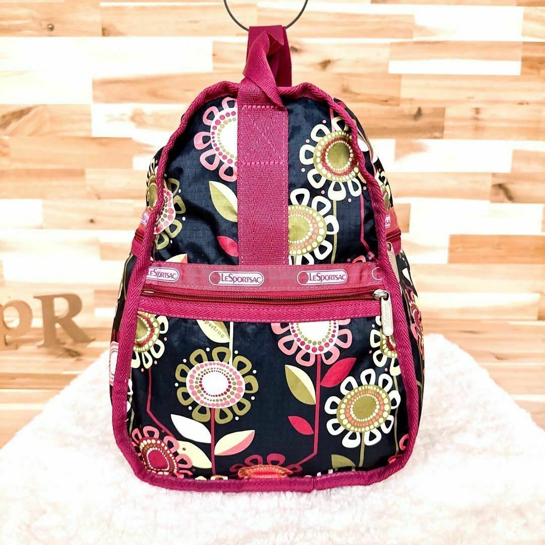 LeSportsac(レスポートサック)の大容量【レスポートサック】花畑 花柄 フラワーモチーフ ボストンバッグ 赤紫×黒 レディースのバッグ(ボストンバッグ)の商品写真