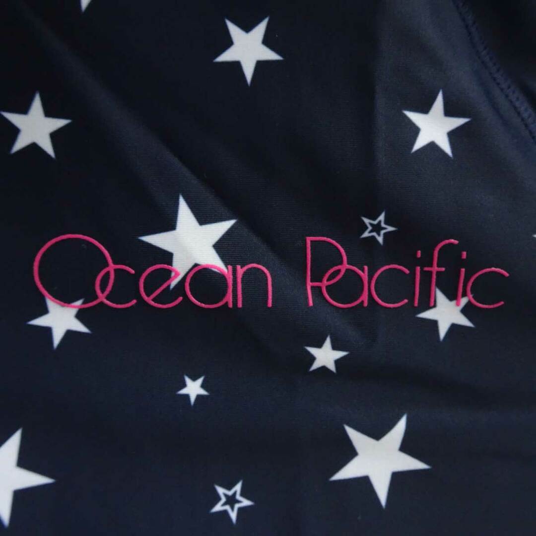 OCEAN PACIFIC(オーシャンパシフィック)の【未使用】[上下セット] オーシャンパシフィック ラッシュガード 星柄 UPF50+ UV ショート サーフパンツ 水着 サイズ7/7S ネイビー 523-452 レディース Ocean Pacific スポーツ/アウトドアのスポーツ/アウトドア その他(マリン/スイミング)の商品写真