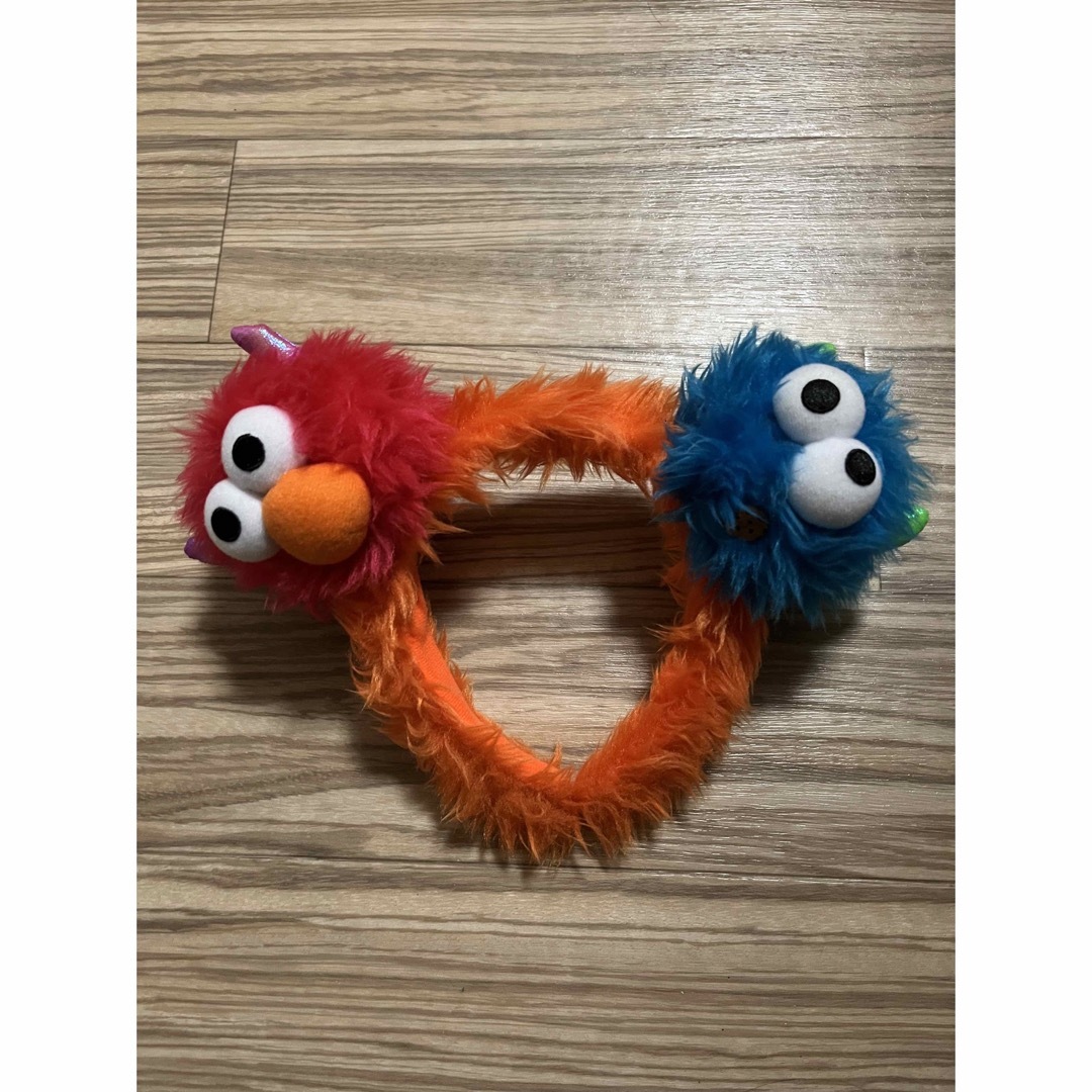 SESAME STREET(セサミストリート)のユニバーサルスタジオジャパン エルモ クッキーモンスター カチューシャ エンタメ/ホビーのおもちゃ/ぬいぐるみ(キャラクターグッズ)の商品写真