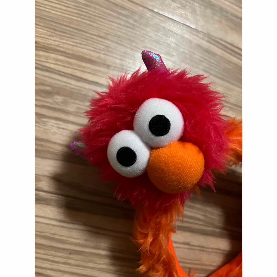 SESAME STREET(セサミストリート)のユニバーサルスタジオジャパン エルモ クッキーモンスター カチューシャ エンタメ/ホビーのおもちゃ/ぬいぐるみ(キャラクターグッズ)の商品写真