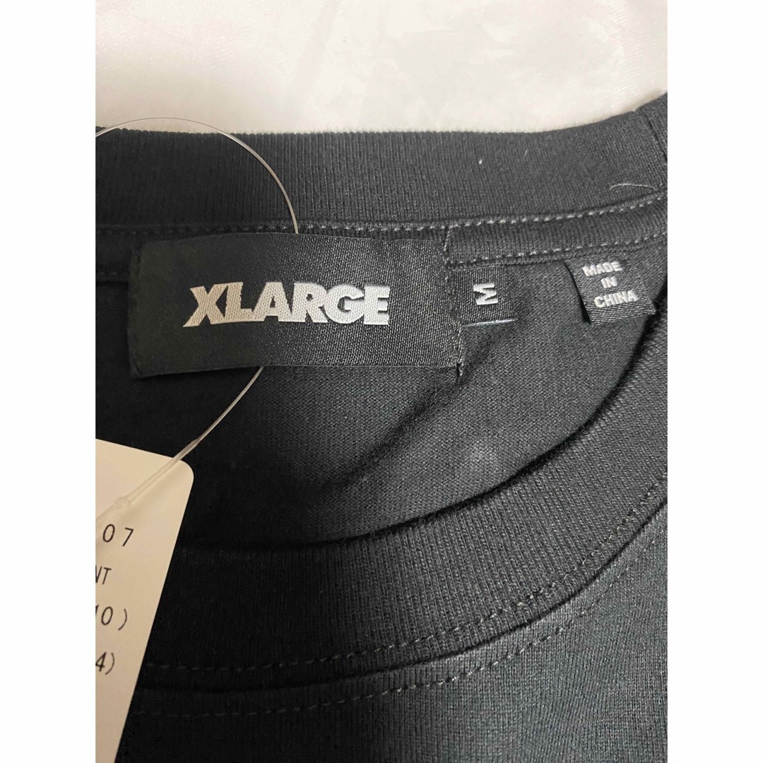 XLARGE(エクストララージ)の新品　エクストララージ　Tシャツ　ブラック　Mサイズ メンズのトップス(Tシャツ/カットソー(半袖/袖なし))の商品写真