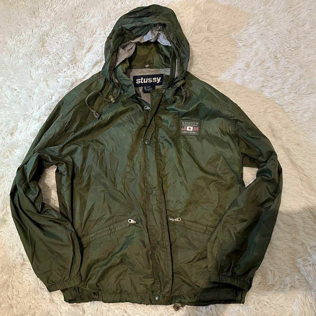 STUSSY - 希少 stussy ナイロンジャケット カーキ フード収納 胸 STUSSY - 希少 stussy ナイロンジャケット カーキ フード収納 胸