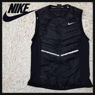 ナイキ(NIKE)の【美品・快適素材】ナイキ　中綿入りベスト　ランニング　ジョギング　黒　H616(ベスト/ジレ)