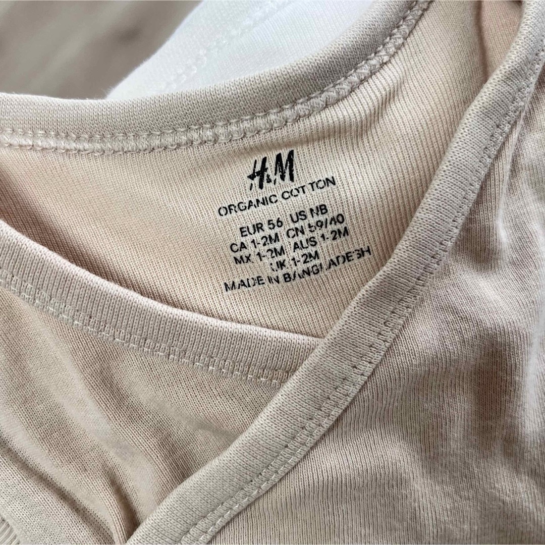 H&M(エイチアンドエム)のH&M ラップボディスーツ　56cm キッズ/ベビー/マタニティのベビー服(~85cm)(肌着/下着)の商品写真