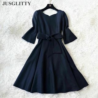 ジャスグリッティー(JUSGLITTY)の【新品未使用】美香×JUSGLITTY ウール100％ フレアワンピース 黒１(ひざ丈ワンピース)