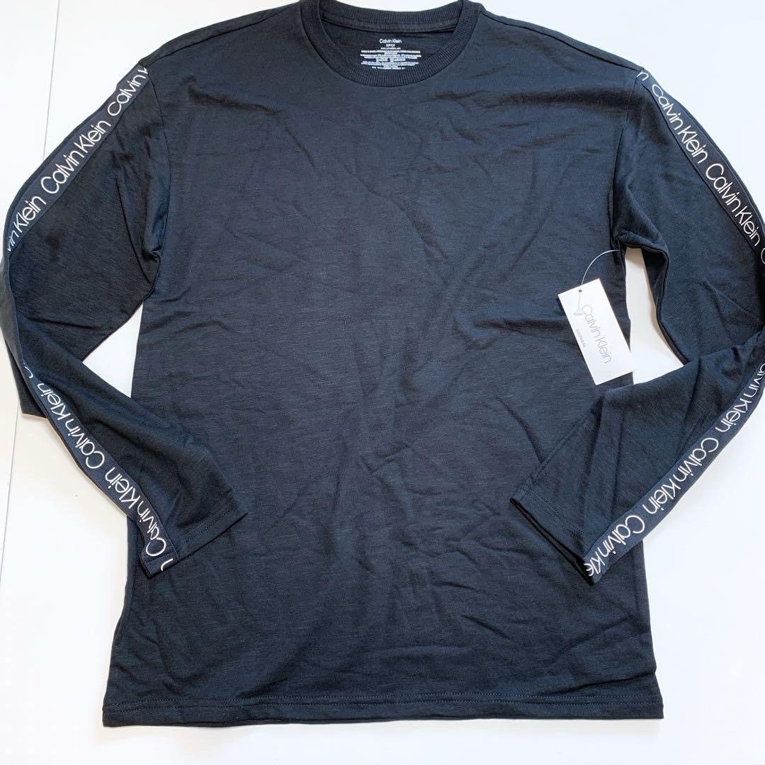 Calvin Klein(カルバンクライン)の【新品】カルバンクライン ロゴテープ ロンT ブラック S  メンズのトップス(Tシャツ/カットソー(七分/長袖))の商品写真