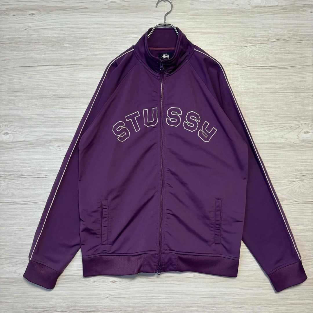 STUSSY(ステューシー)の【希少デザイン】ステューシー　ジャージ　Lサイズ　センターロゴ　アーチロゴ　希少 メンズのトップス(ジャージ)の商品写真