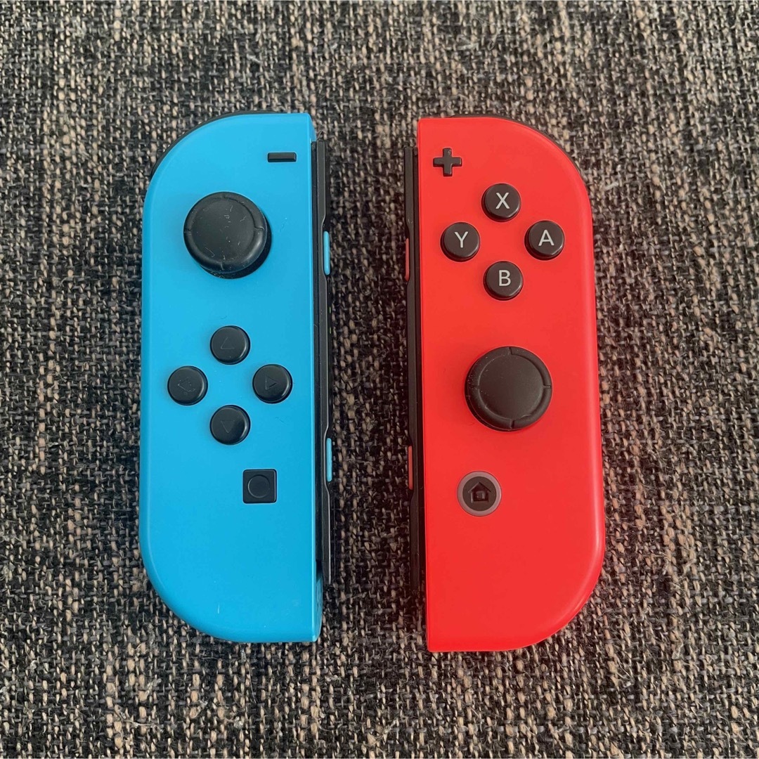 Nintendo Switch(ニンテンドースイッチ)の任天堂switch Joy-Con 左右⭐︎ストラップ付⭐︎ ジャンク品 エンタメ/ホビーのゲームソフト/ゲーム機本体(その他)の商品写真