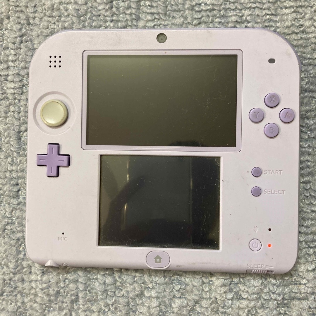 ニンテンドー2DS(ニンテンドー2DS)の2dsラベンダー本体ジャンクカバー欠品 エンタメ/ホビーのゲームソフト/ゲーム機本体(携帯用ゲーム機本体)の商品写真