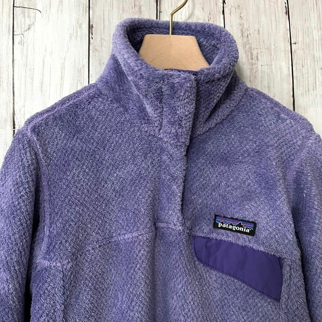 patagonia(パタゴニア)のレディース古着　パタゴニア　ポーラテックフリースハーフスナップT サイズXS 紫 レディースのジャケット/アウター(ブルゾン)の商品写真