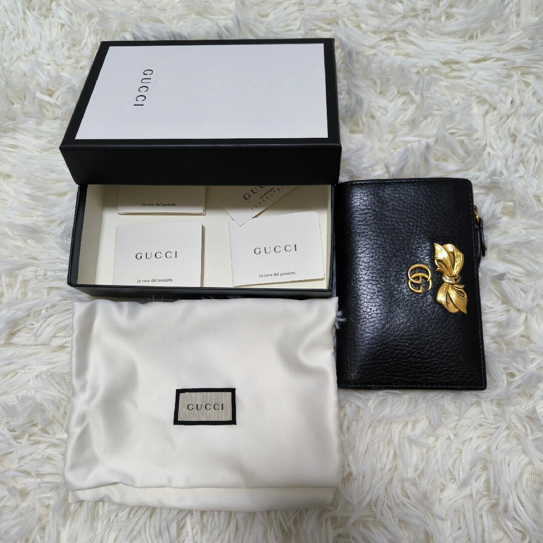 Gucci(グッチ)の【廃番品】GUCCI 折財布　二つ折り　折りたたみお財布　リボン　花柄 メンズのファッション小物(折り財布)の商品写真