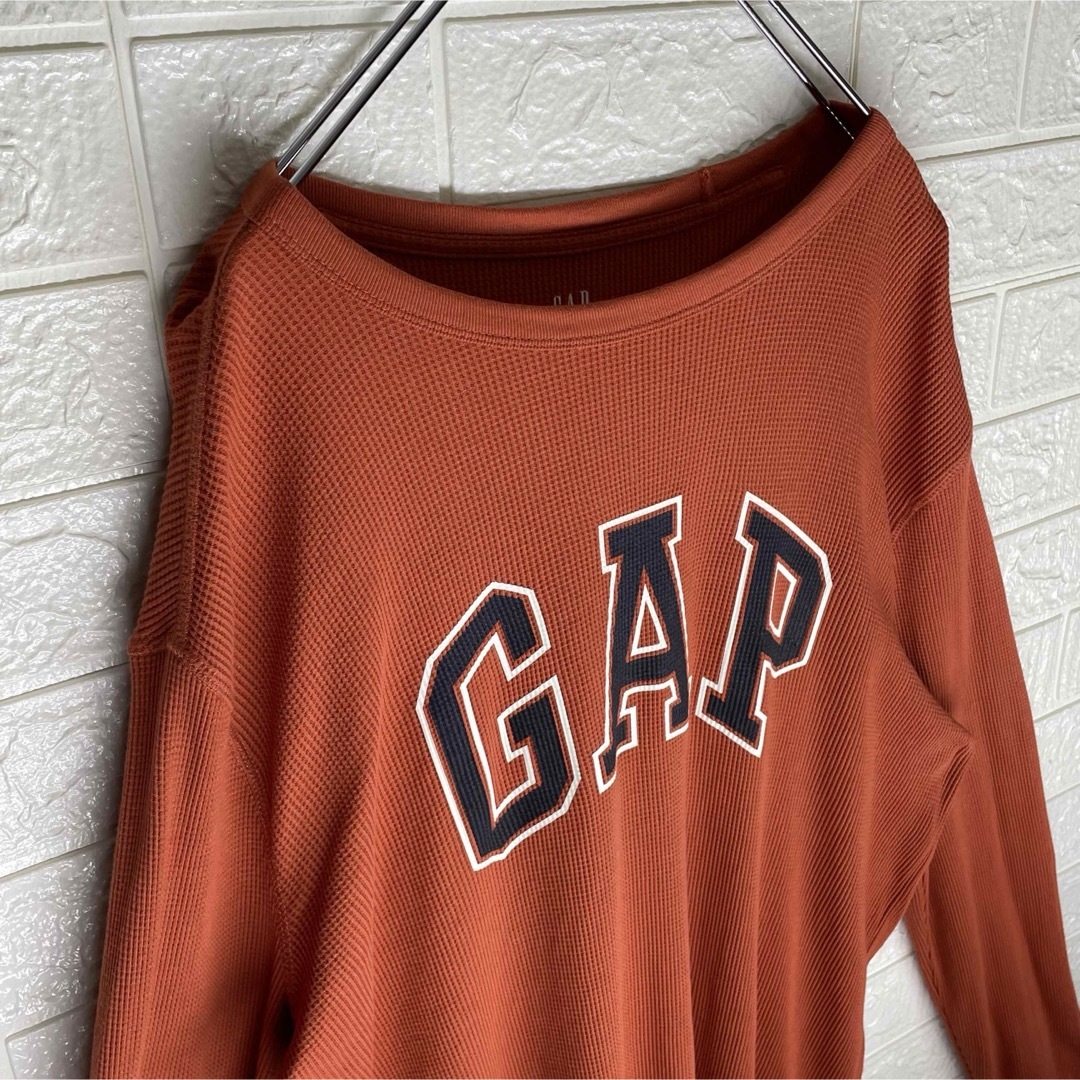 GAP(ギャップ)のギャップ　ビッグロゴ入り　カットソー　オレンジ　Mサイズ メンズのトップス(Tシャツ/カットソー(七分/長袖))の商品写真