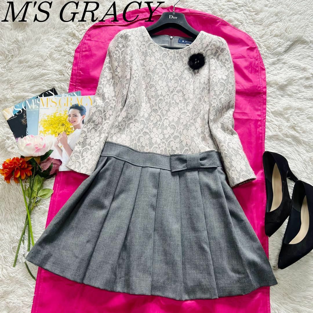 M'S GRACY(エムズグレイシー)の【美品】M'S GRACY 膝丈ワンピース レース ブローチ グレー 36 レディースのワンピース(ひざ丈ワンピース)の商品写真