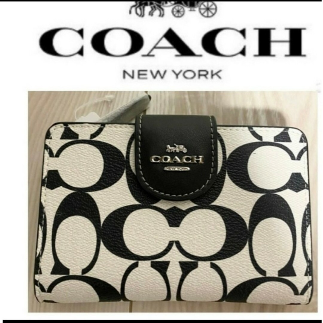 COACH(コーチ)の新品　COACH　二つ折り財布　小銭入れ有　シグネチャー　ブラック　ホワイト レディースのファッション小物(財布)の商品写真
