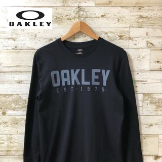 オークリー(Oakley)の【美品】オークリー OAKLEY 長袖 ブラック 前面プリント(Tシャツ/カットソー(七分/長袖))