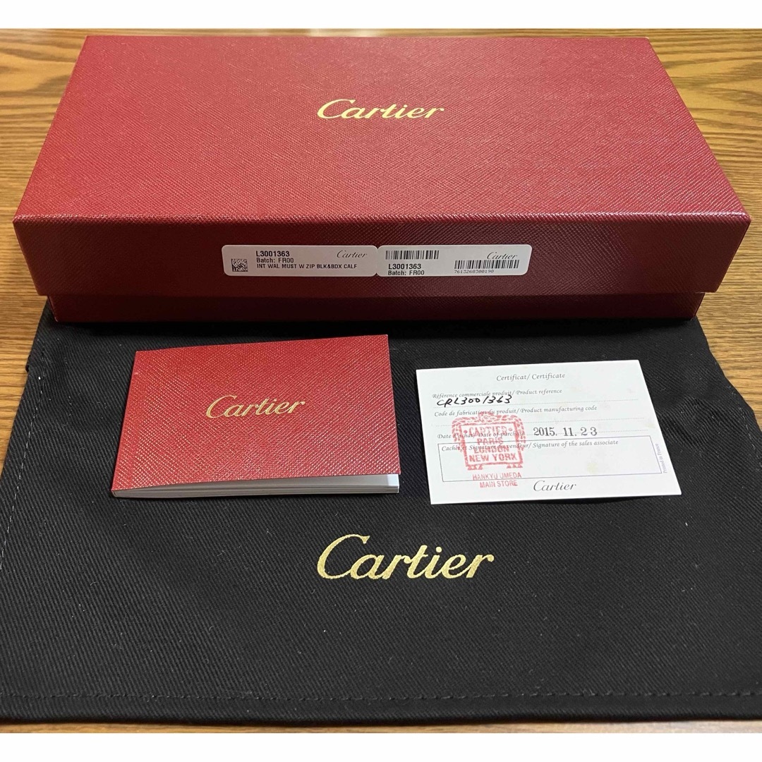 Cartier(カルティエ)のマスト ドゥ カルティエ ラウンドジップインターナショナル ウォレット メンズのファッション小物(長財布)の商品写真