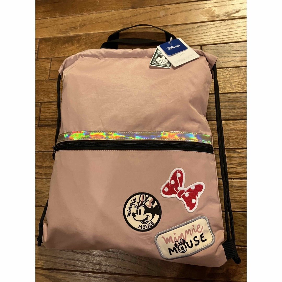 Disney(ディズニー)の新品タグ付きディズニー　ワッペン　ナップサック　ピンク可愛いミニーのワッペン レディースのバッグ(リュック/バックパック)の商品写真