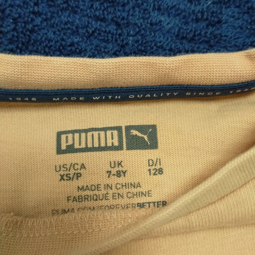 PUMA(プーマ)のPUMA プーマ Ｔシャツ 薄オレンジ 半袖 カットソー 120cm キッズ キッズ/ベビー/マタニティのキッズ服男の子用(90cm~)(Tシャツ/カットソー)の商品写真