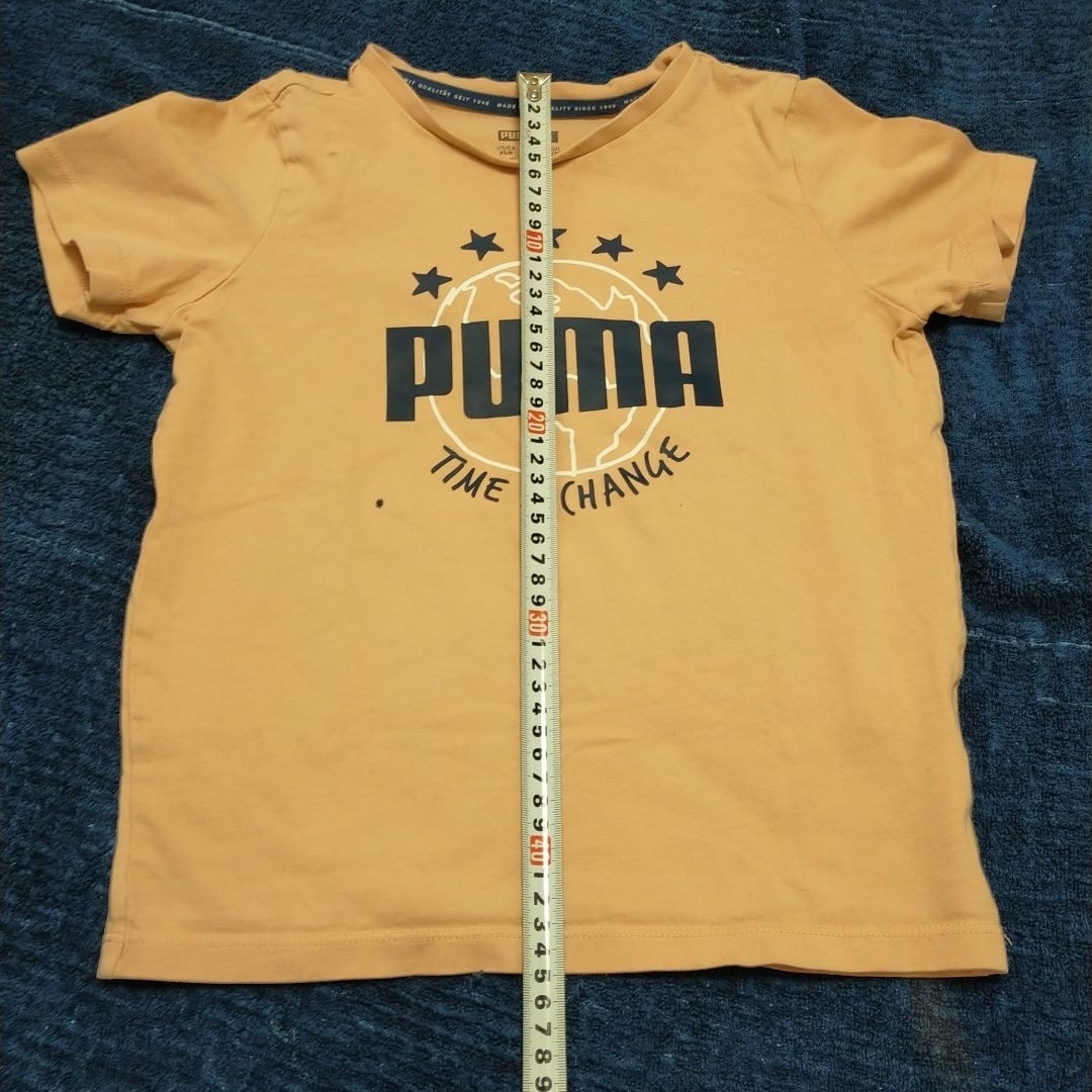 PUMA(プーマ)のPUMA プーマ Ｔシャツ 薄オレンジ 半袖 カットソー 120cm キッズ キッズ/ベビー/マタニティのキッズ服男の子用(90cm~)(Tシャツ/カットソー)の商品写真