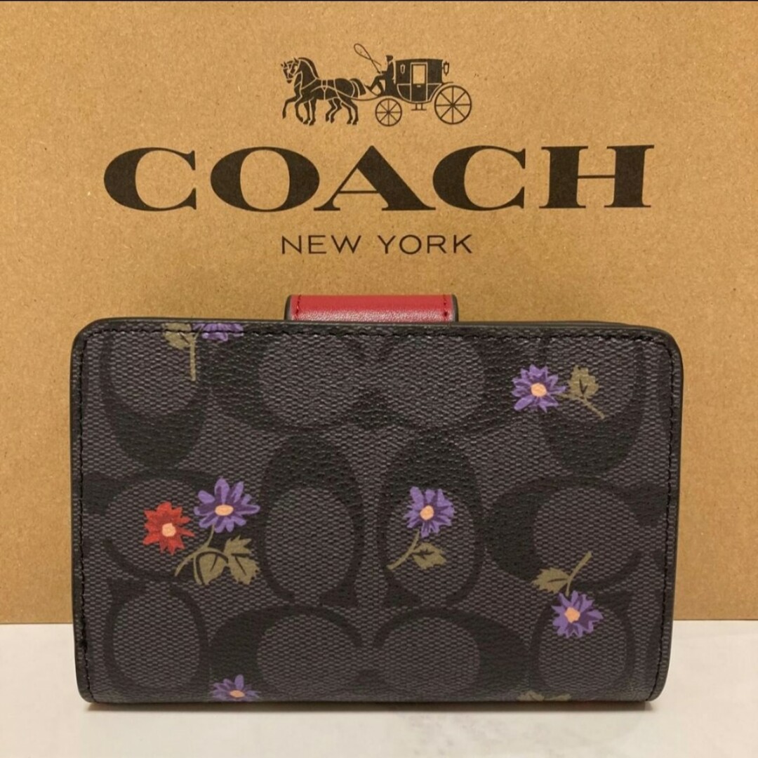 COACH(コーチ)の新品　COACH　二つ折り財布　小銭入れ有　ダークブラウン　シグネチャー　花柄 レディースのファッション小物(財布)の商品写真