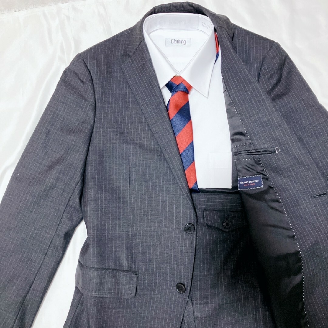 THE SUIT COMPANY(スーツカンパニー)の極美品　スーツカンパニー セットアップ　スーツ　ネイビー　玉虫色　M メンズのスーツ(セットアップ)の商品写真