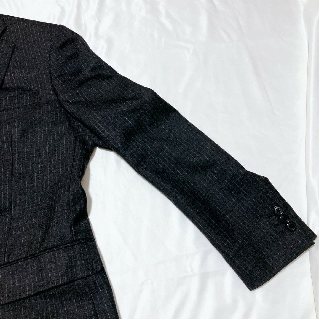 THE SUIT COMPANY(スーツカンパニー)の極美品　スーツカンパニー セットアップ　スーツ　ネイビー　玉虫色　M メンズのスーツ(セットアップ)の商品写真