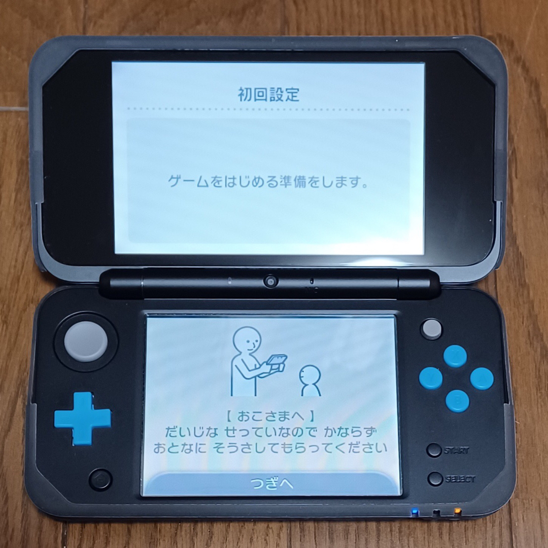 ニンテンドー2DS(ニンテンドー2DS)のnewニンテンドー2DS LL ブラック×ターコイズ 中古 エンタメ/ホビーのゲームソフト/ゲーム機本体(携帯用ゲーム機本体)の商品写真