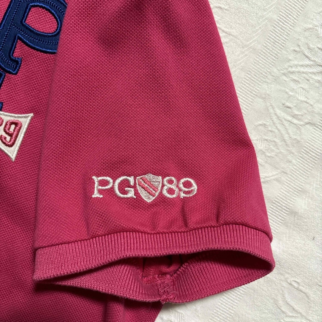PEARLY GATES(パーリーゲイツ)のパーリーゲイツレデース　刺繍ワッペンポロシャツ　ピンク レディースのトップス(ポロシャツ)の商品写真